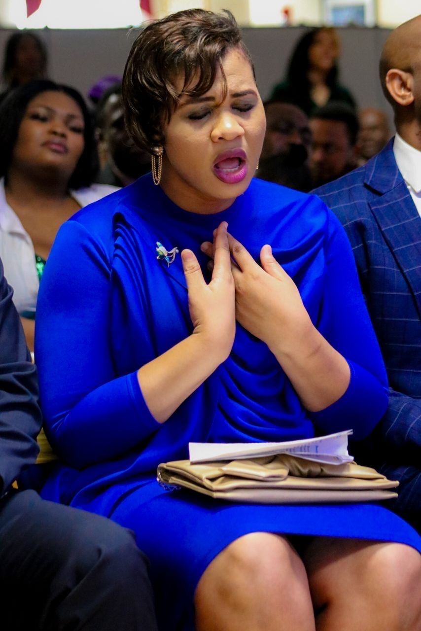 Worshipper in prayer during a Tabernacle Chosen Generation service in Trenton, NJ