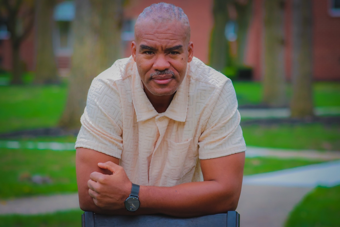 Outdoor portrait session of a man in a park by TECHINRI AGENCY